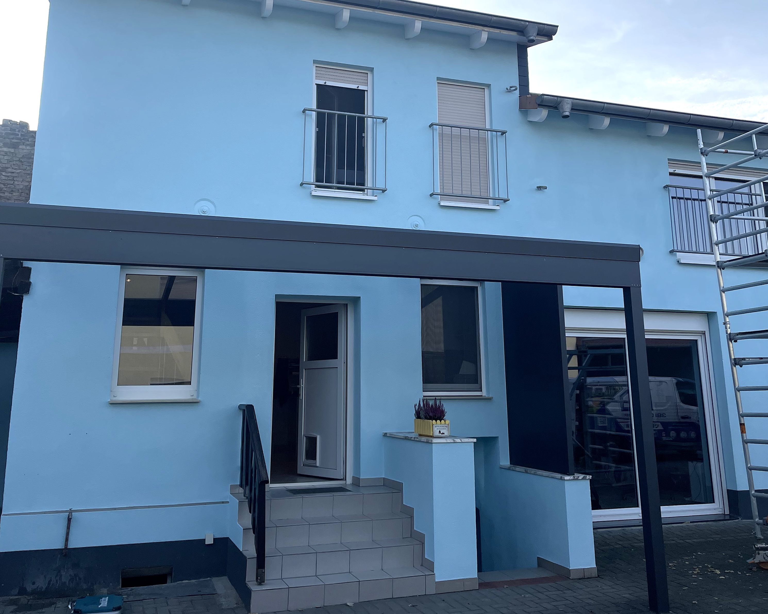 older man having his hair blow dried